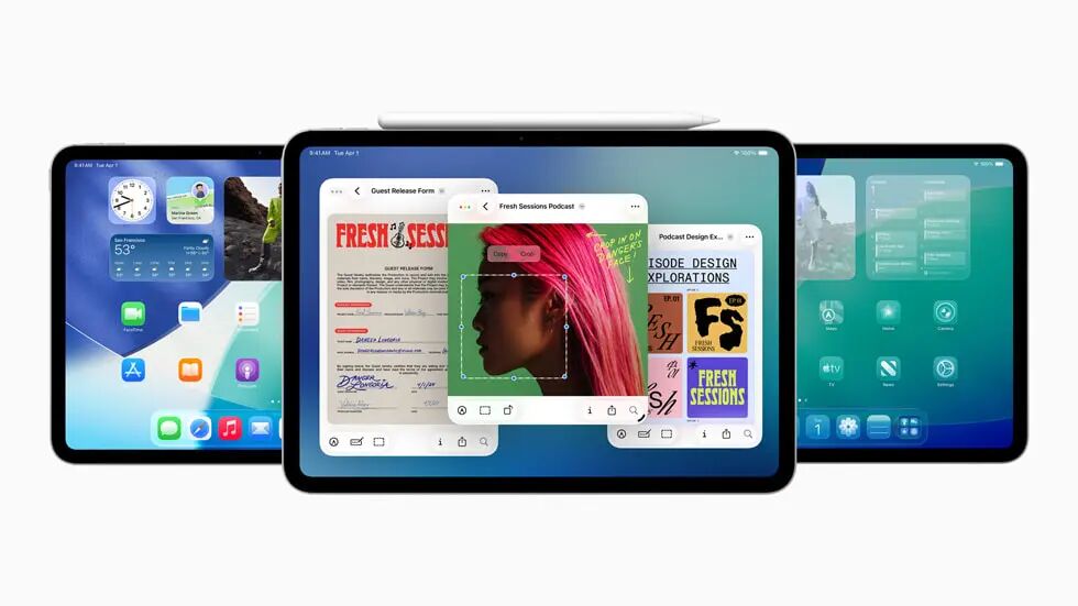 三台 iPad 设备显示着 iPadOS 26 的新功能,中间的设备上放着一支 Apple Pencil。